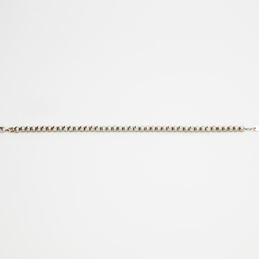 14K white gold ball bracelet with textured beads, laid flat, made in Italy, on white background