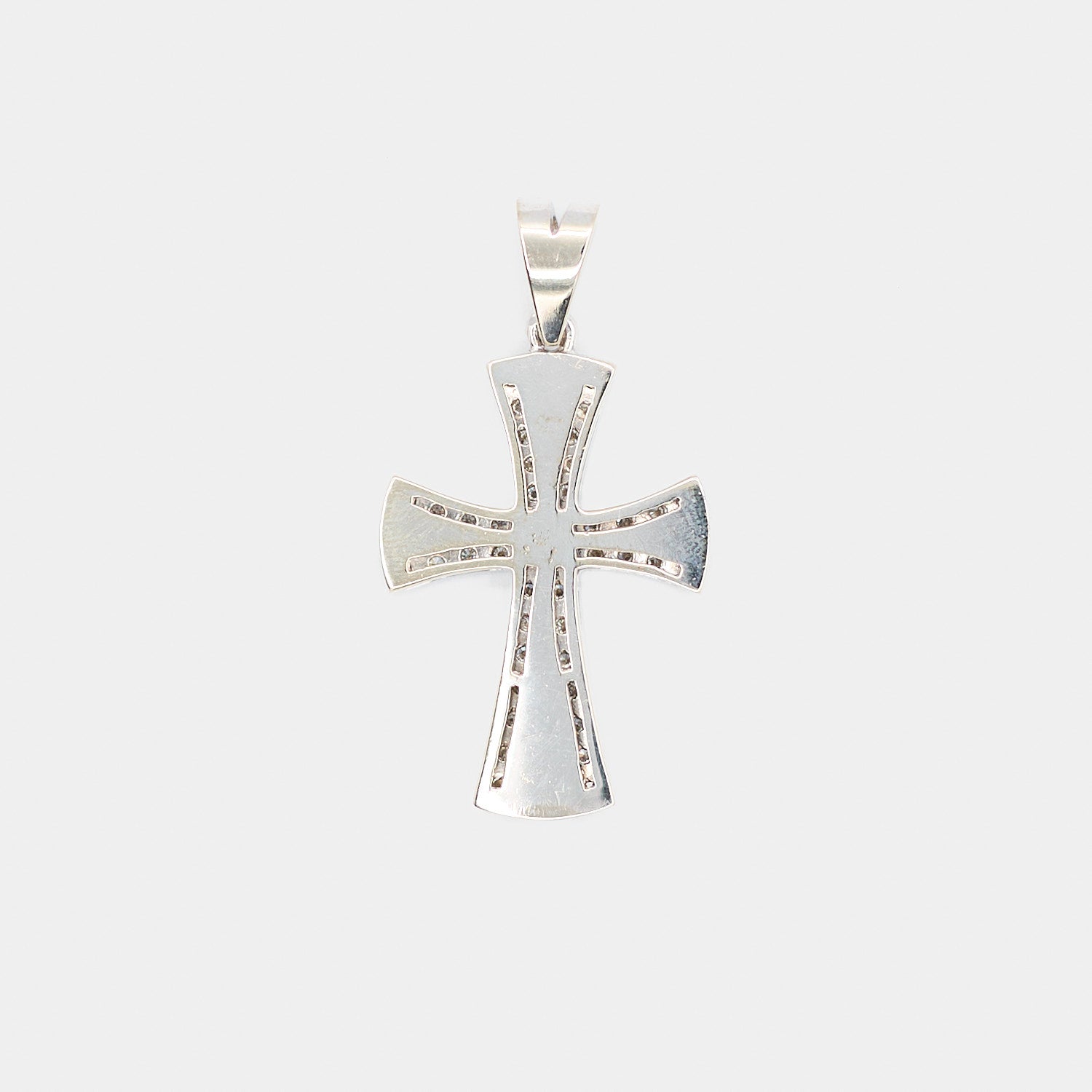 Back view of a pre-owned 14K white gold diamond cross pendant showing the reverse side, weighing 7.43 grams.