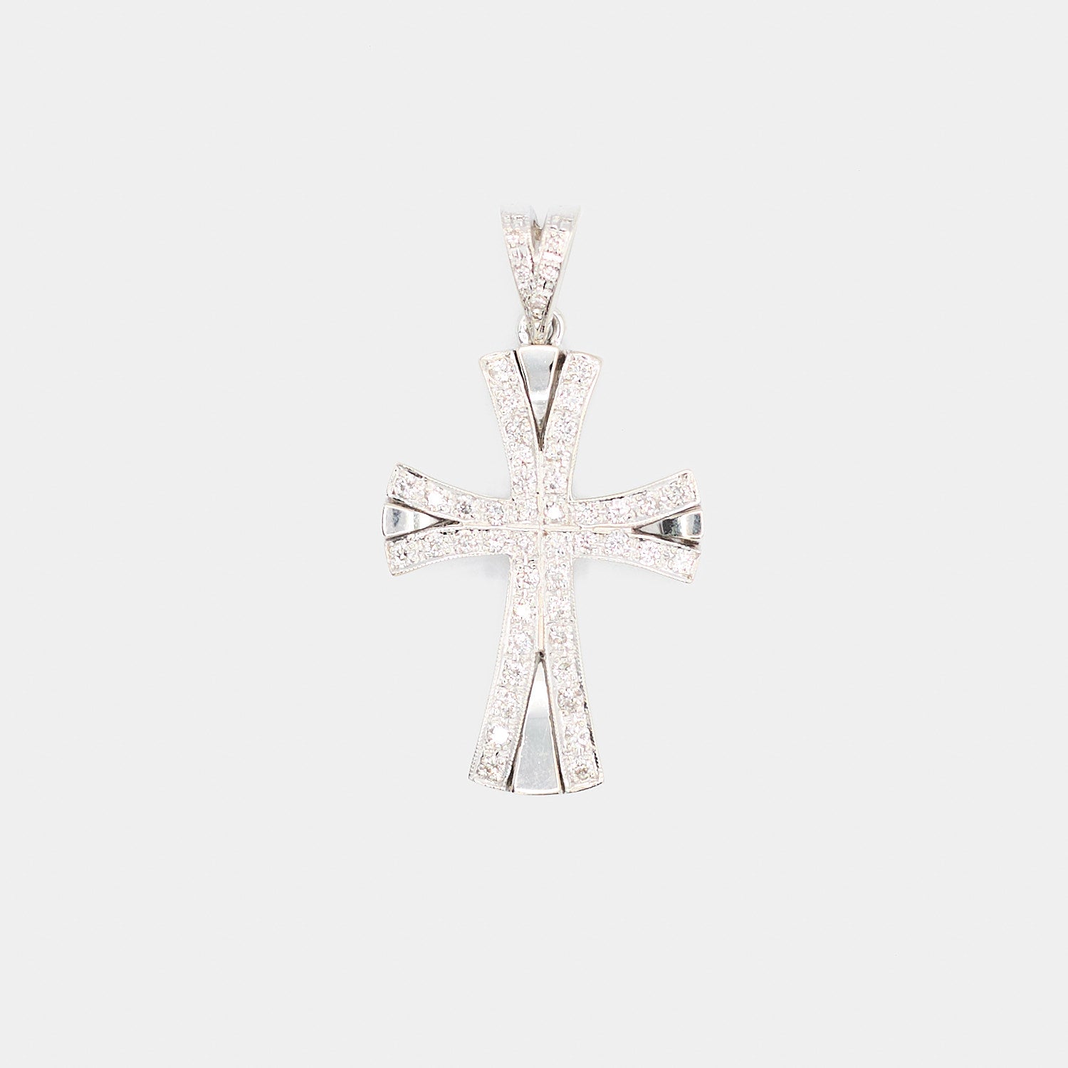 Close-up front view of a pre-owned 14K white gold cross pendant with flared arms, laid flat, showing diamond chips pave set down the center of each arm.