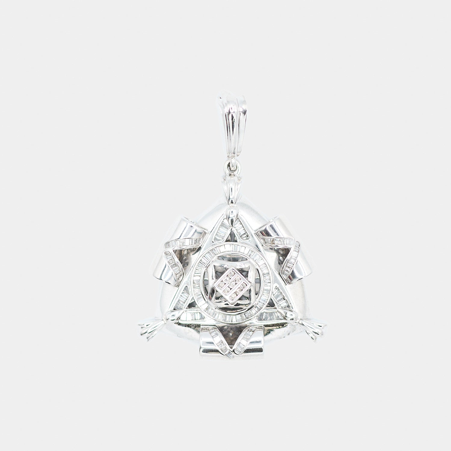 Close-up front view of a pre-owned 14K white gold Freemason pendant featuring baguette-cut diamonds set in a triangular pattern with scroll style arms and a center cluster of round diamonds, total 3.93 carats.