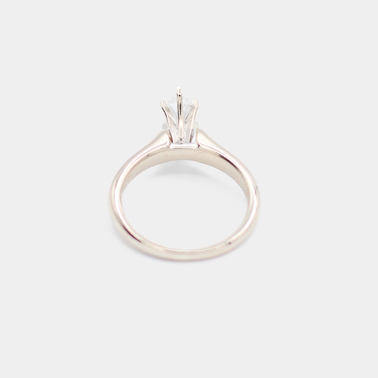 Back view of a pre-owned 14K white gold engagement ring showing the prong setting from behind, weighing 3.67 grams.