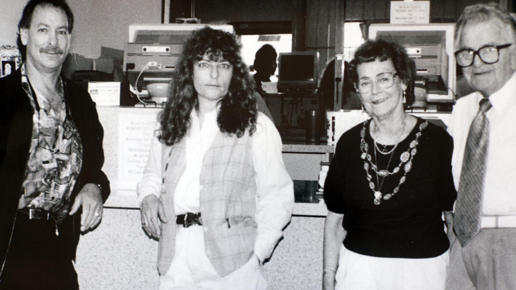 This historic photograph features the Smith family running B.G. Loan & Jewelry Co several decades ago