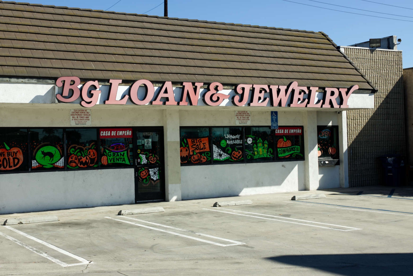 Storefront with 'BG Loan & Jewelry' sign on a clear day