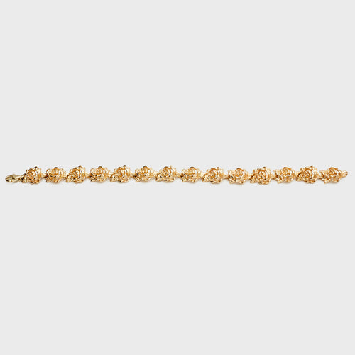 14K Gold Flower Link Bracelet on white background, verified by B.G. Loan & Jewelry