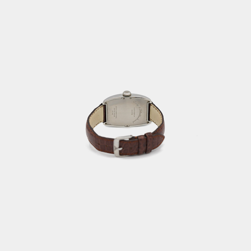 The reverse view of the Dubey & Schaldenbrand Aerodyn Date watch, showing the stainless steel case back and the authentic brown alligator leather band.