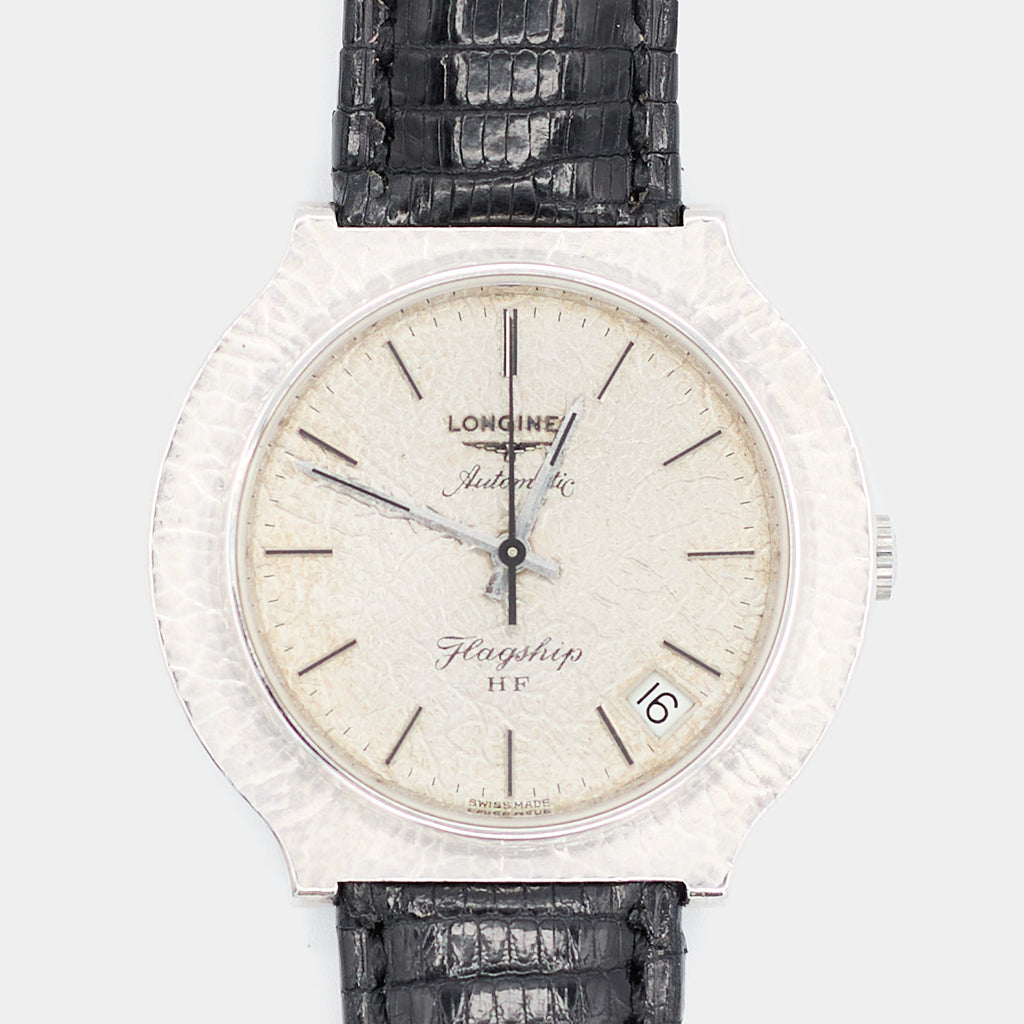 Close-up of a pre-owned Longines Flagship HF watch dial showing the applied markers, date window, and Swiss Made signature.