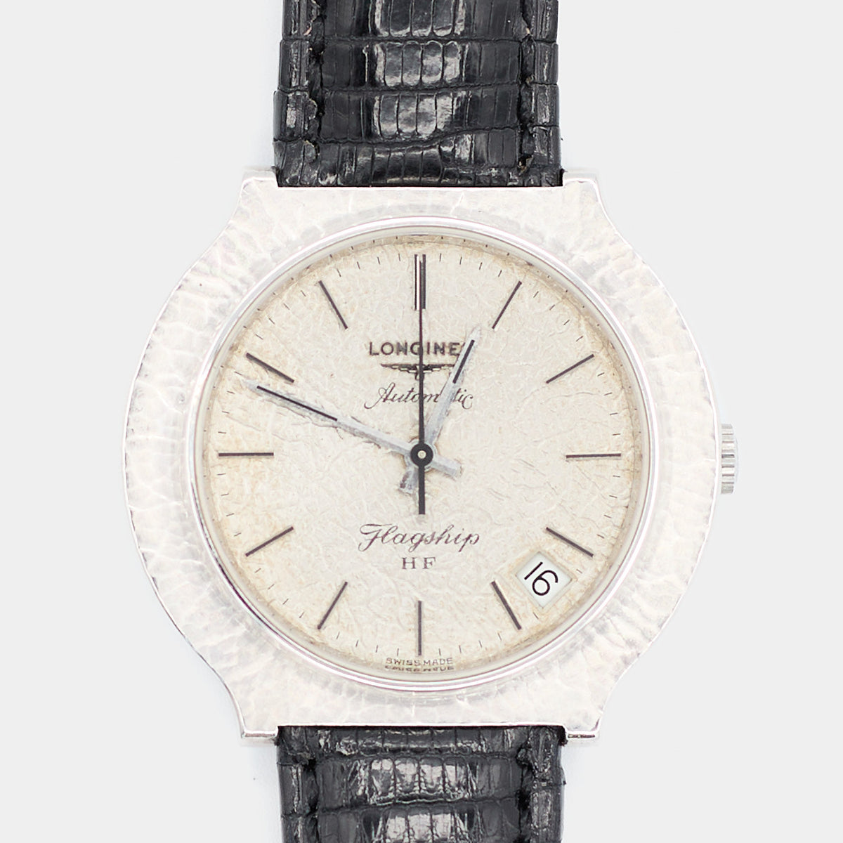 Close-up of a pre-owned Longines Flagship HF watch dial showing the applied markers, date window, and Swiss Made signature.