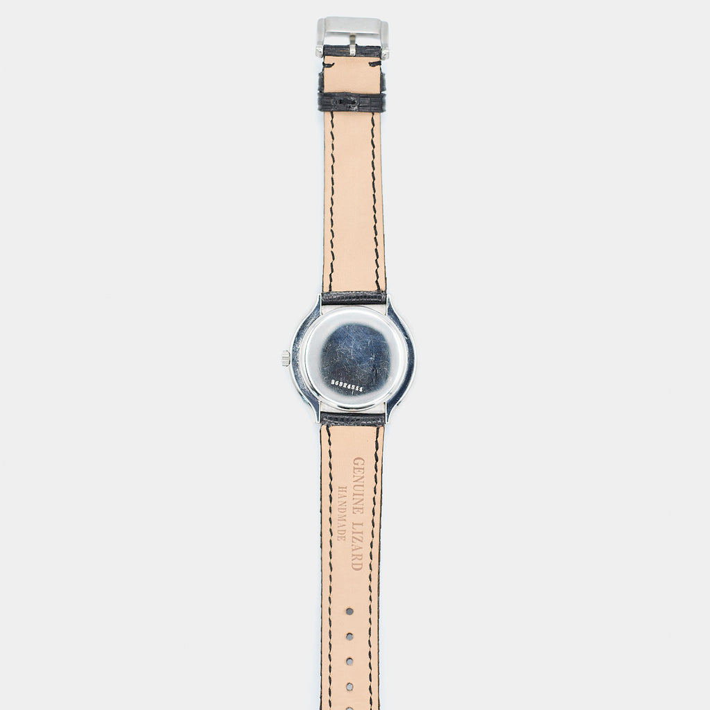 Full length back view of a pre-owned Longines Flagship HF watch laid flat, showing the case back and strap.