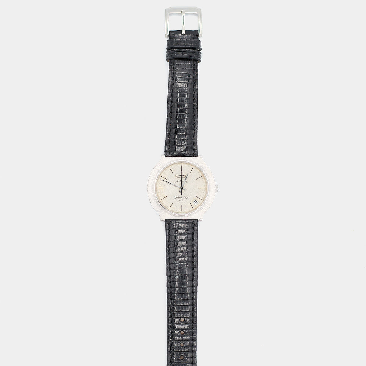 Full length front view of a pre-owned Longines Flagship HF watch laid flat, showing the complete case, dial, and lizard leather strap.