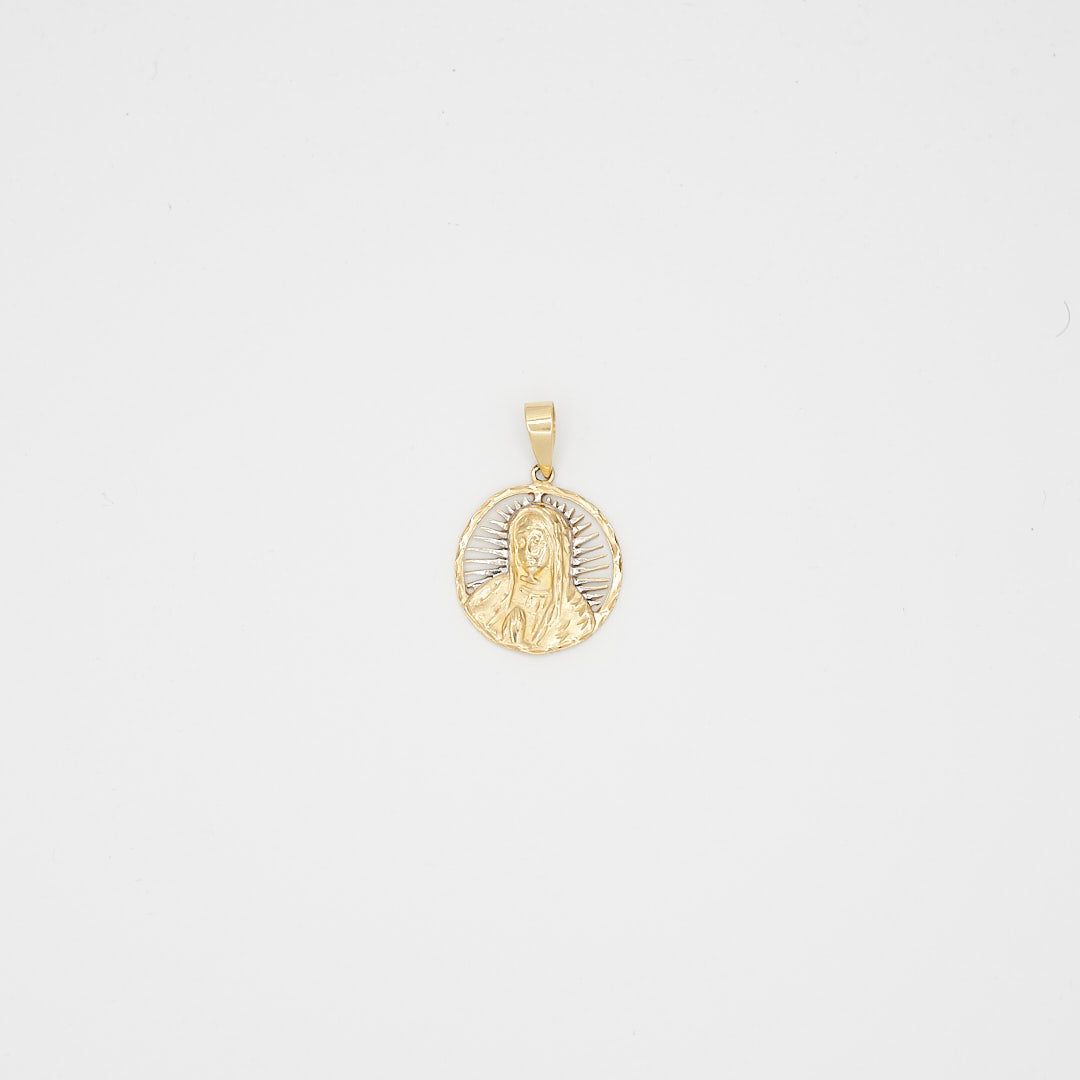 Close-up view of the 10K dual-tone gold Virgin Mary pendant, laid flat, showcasing the religious motif and 16.5 gram total weight.