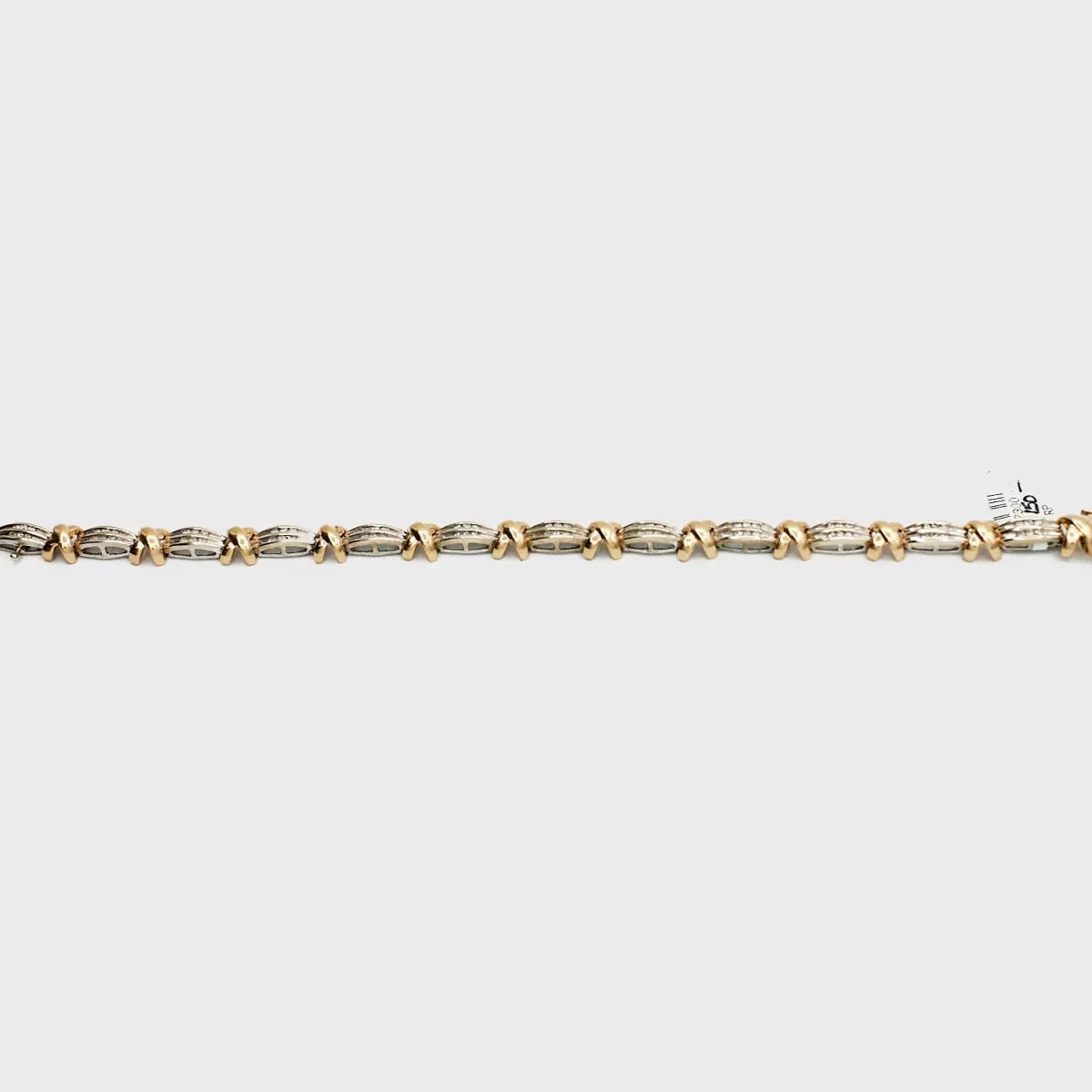 Pre-Owned 10K Gold/White Gold Diamond Dual Tone ‘X’ Bracelet - 7.25" | B.G. Loan & Jewelry Co. - B.G. Loan & Jewelry Co.