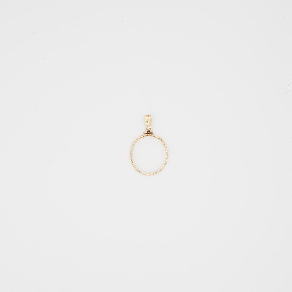 Close-up view of the 14K gold coin bezel frame, laid flat, showcasing the construction and the 1.98 gram weight