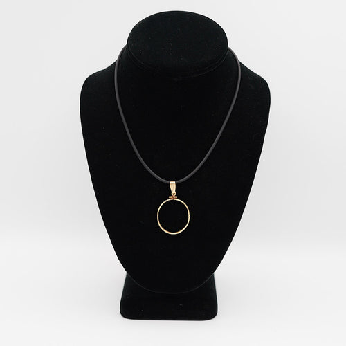 Verified pre-owned 14K gold coin bezel pendant, 1.625 inches long, featuring the removable screw-off top, displayed on a black mannequin.