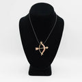 Pre-Owned 14K Gold Red Stone Bow and Arrow Pendant - 2" | B.G. Loan & Jewelry Co. - B.G. Loan & Jewelry Co.