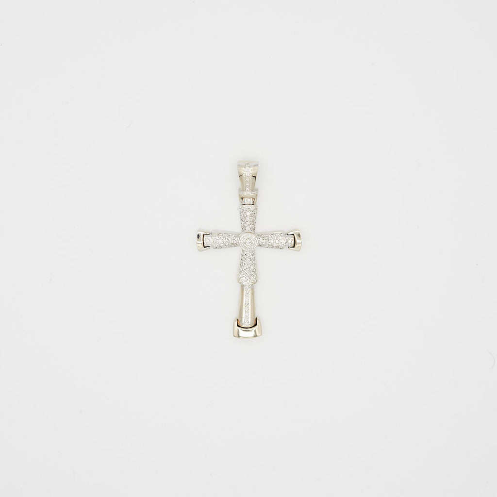 Close-up view of the 14K white gold diamond cross pendant, laid flat, showcasing the round cut diamond placement and 20.65 gram weight.