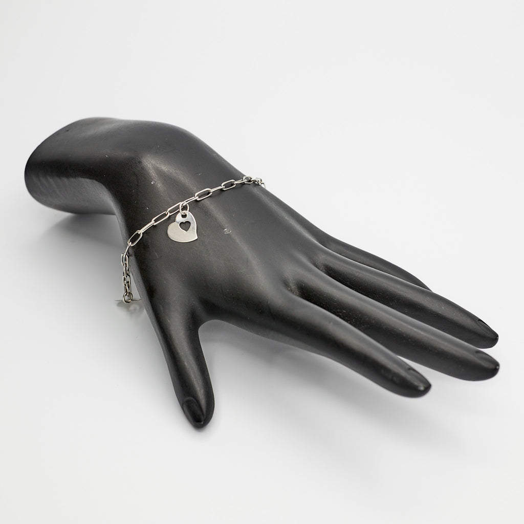 Pre-Owned 14K white gold heart charm bracelet, 9.25 inches, styled on a mannequin to show fit as an anklet.