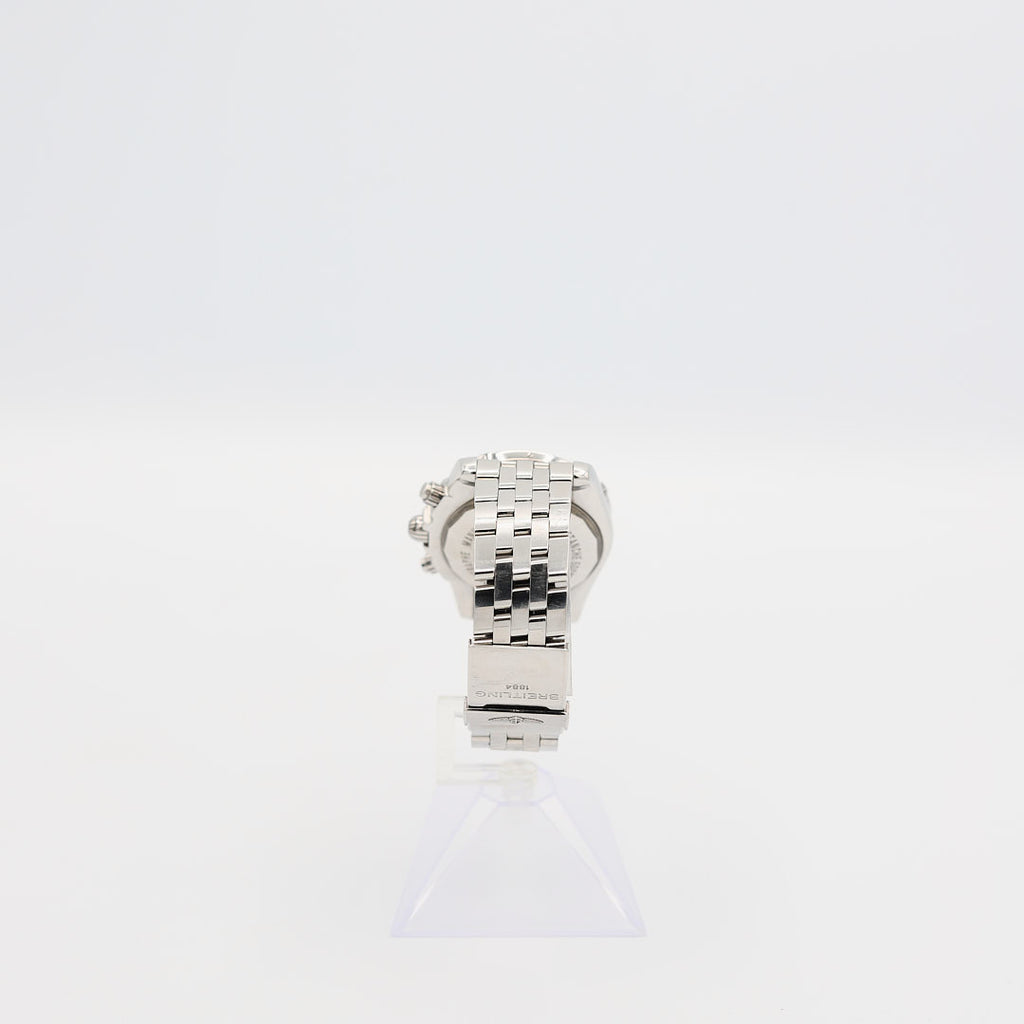 Back view of the verified Breitling Chronomat 44 stainless steel watch standing up, showcasing full bracelet construction.