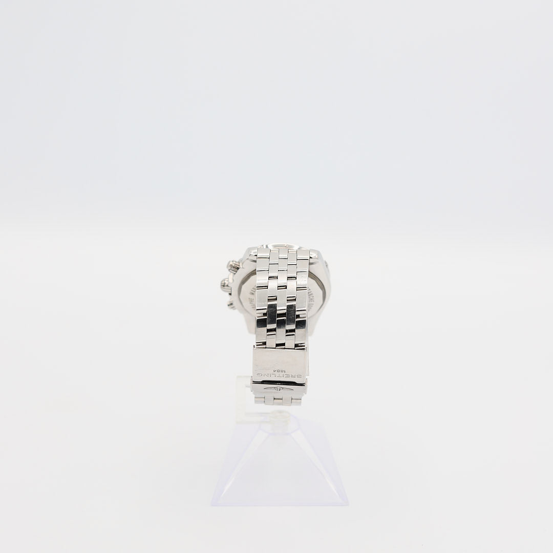Back view of the verified Breitling Chronomat 44 stainless steel watch standing up, showcasing full bracelet construction.