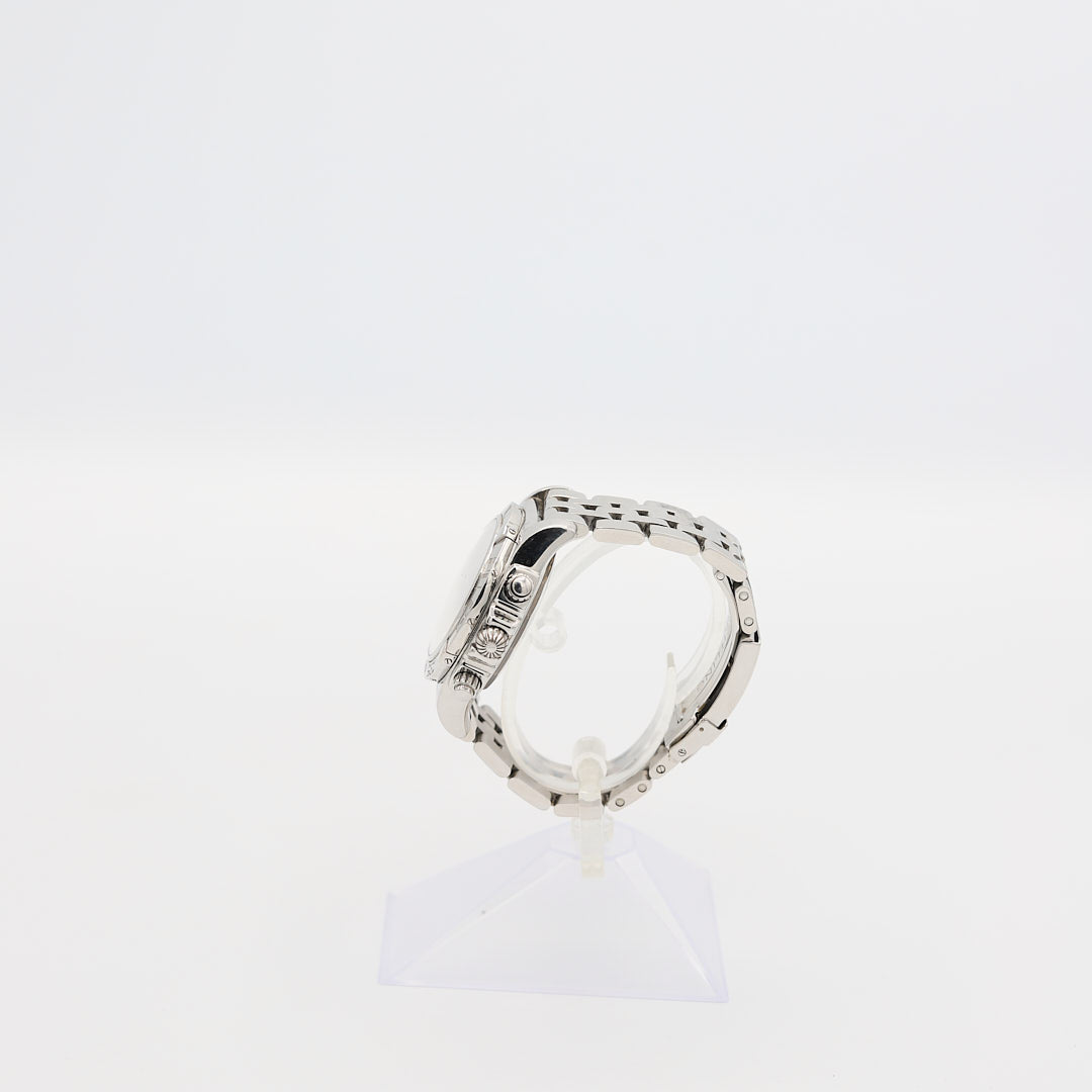 Right-side profile view of the Breitling Chronomat 44mm watch, showcasing the large crown and chronograph pusher controls.