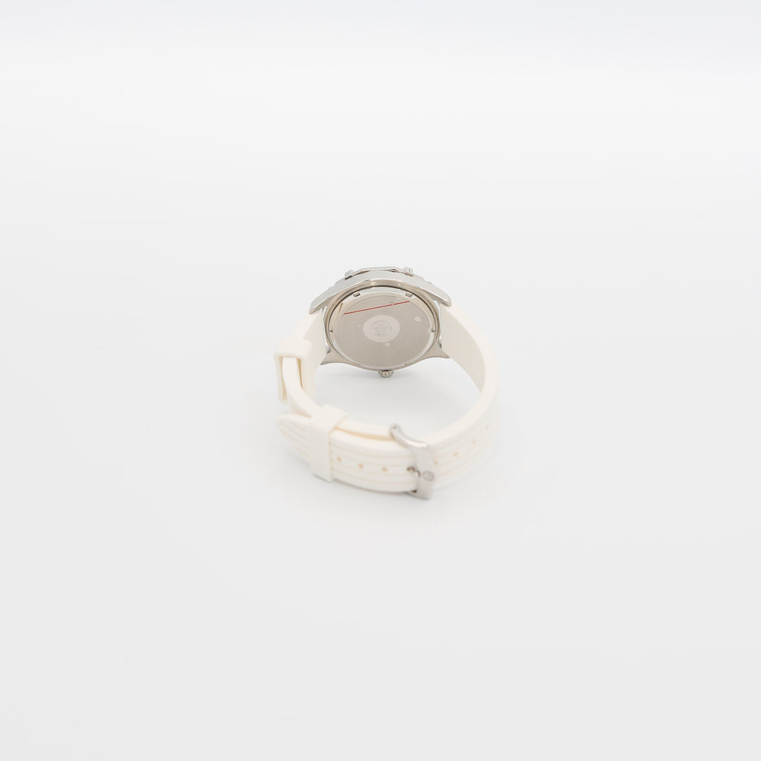 Underside view of the Bulova Marine Star watch, showcasing the case back, serial number, and texture of the white rubber wristband.