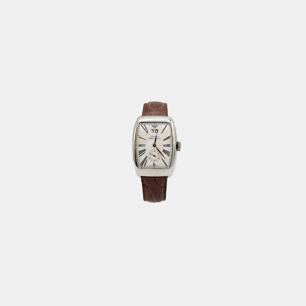 Verified pre-owned Dubey & Schaldenbrand Aerodyn Date stainless steel automatic watch, 33mm tonneau case with silver dial and brown alligator strap.