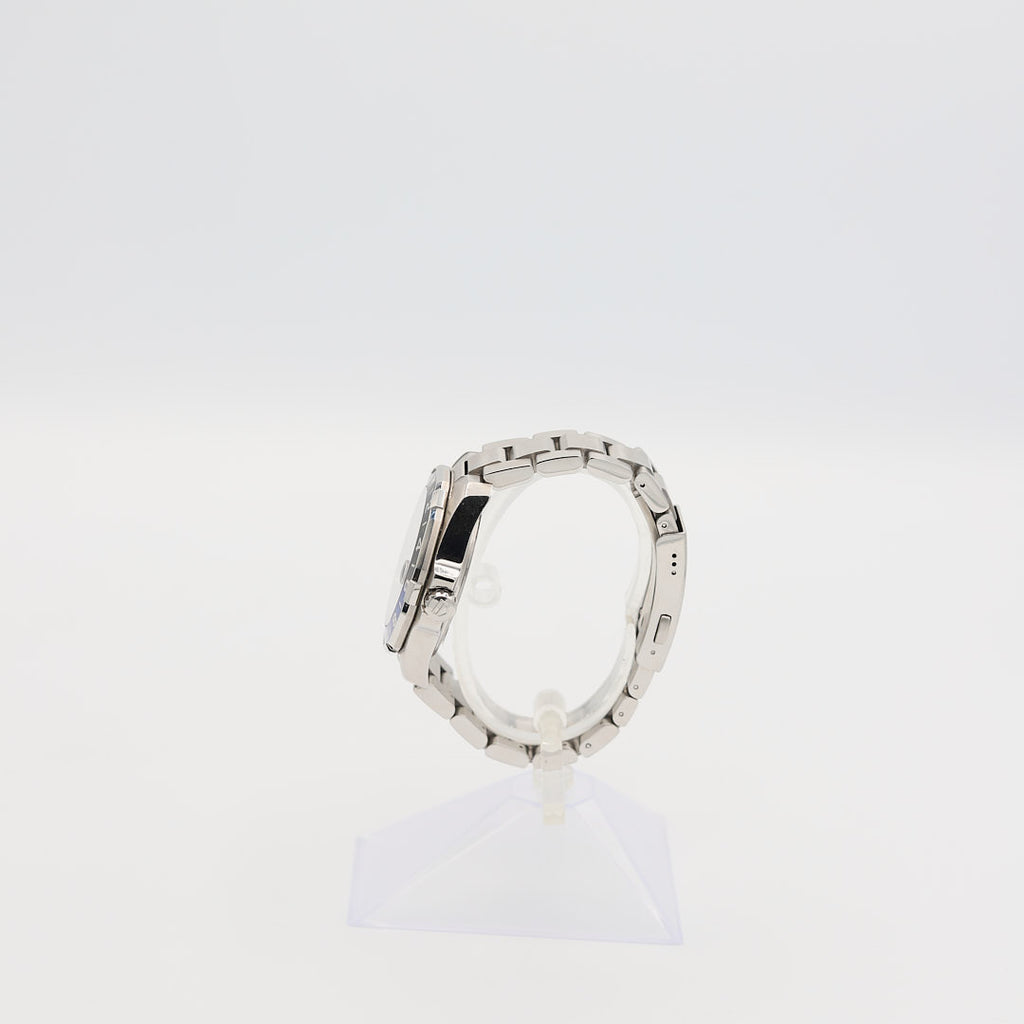 Right-side profile view of the TAG Heuer Aquaracer 43mm watch, showcasing the large diving crown and rugged case profile.