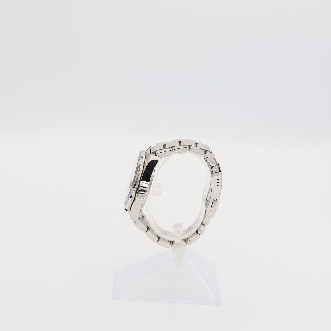 Right-side profile view of the TAG Heuer Aquaracer 43mm watch, showcasing the large diving crown and rugged case profile.